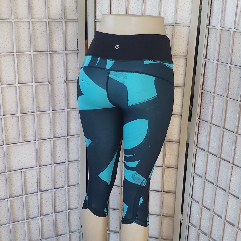 Lululemon Top Speed Black And Teal Under Knee Womens Leggings Size 4